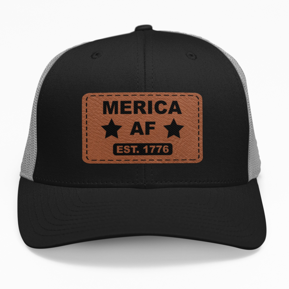 Preview of the 'Merica AF' leatherette patch on a custom hat, showing how the bold design looks when applied to an adjustable snapback.