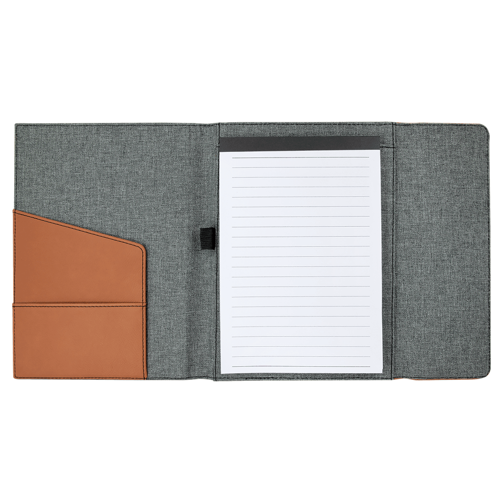 Interior View: "Inside of the Leatherette Portfolio featuring a pen holder, business card slot, and replaceable notepad."