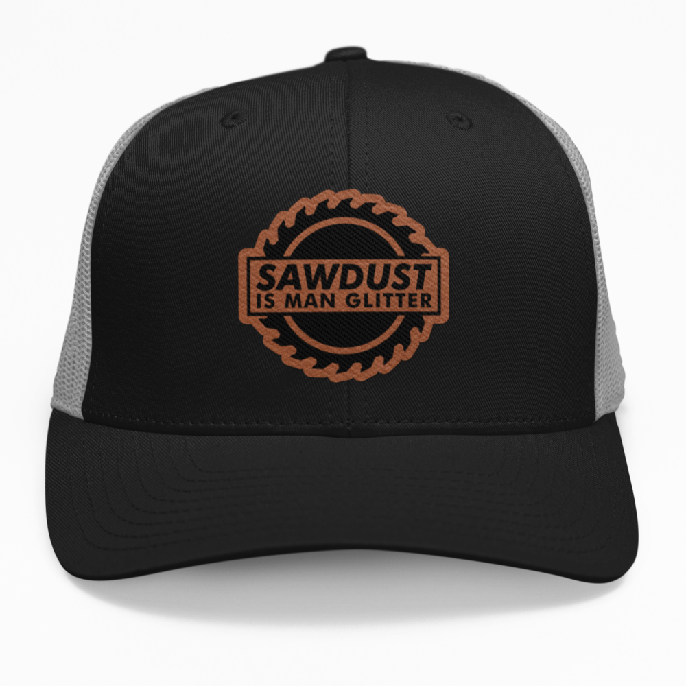 Preview of the "Saw Dust is Man Glitter" leatherette patch on a custom hat.