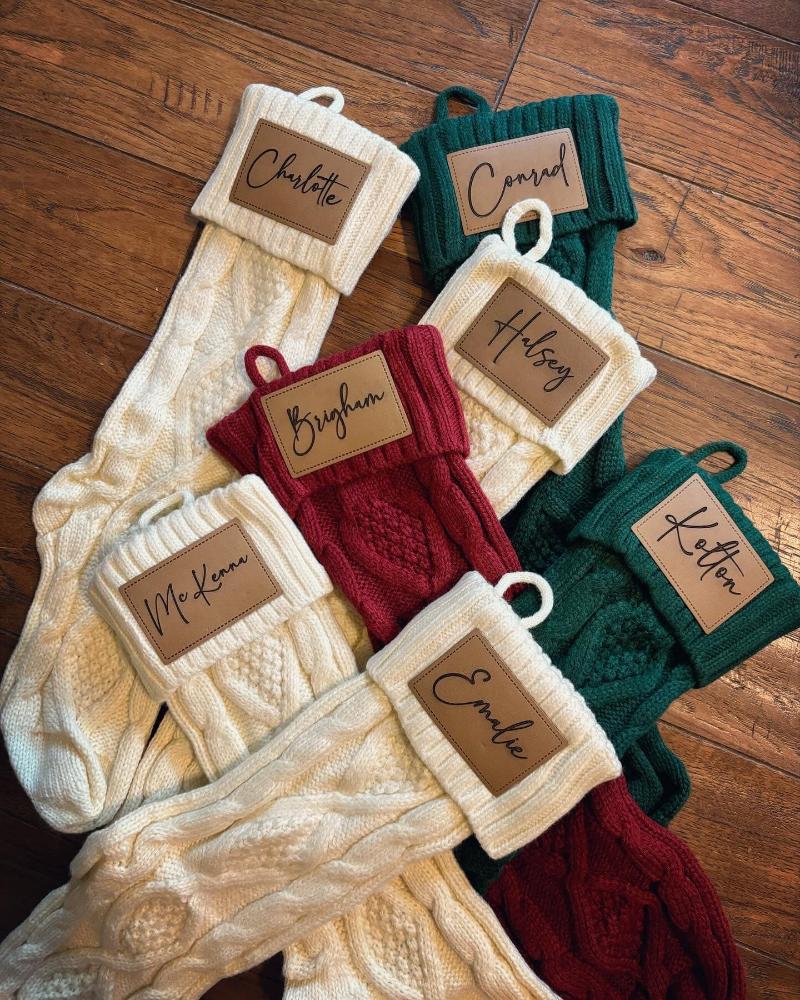 Close-up of the Personalized Knit Christmas Stocking, showcasing the classic cable knit pattern and engraved name patch