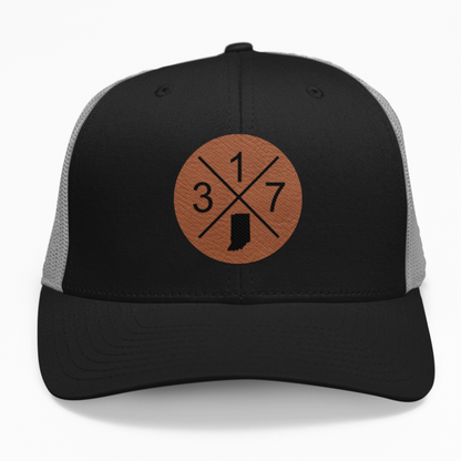 Preview of the custom area code and state leatherette patch on a custom hat.