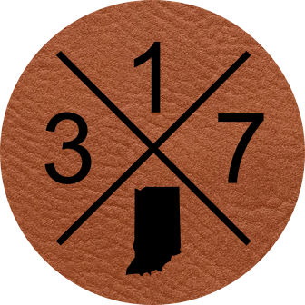 Close-up of a customizable leatherette patch featuring a 3-digit area code and state shape.