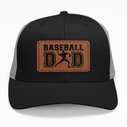 Preview of the 'Baseball Dad - Pitcher' leatherette patch on a custom hat, showing the baseball design on an adjustable snapback.