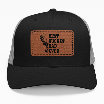 Preview of the 'Best Buckin' Dad' leatherette patch on a custom hat, showing how the hunting design looks on an adjustable snapback.