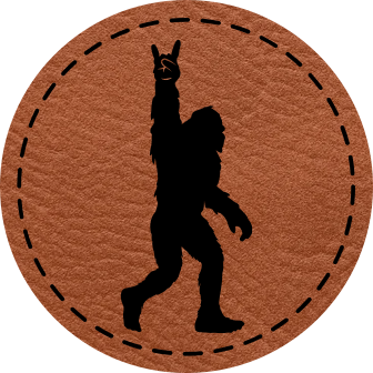 Close-up of the 'Bigfoot Silhouette Rock Out' leatherette patch featuring Bigfoot throwing rock horns, perfect for music lovers and Sasquatch fans.