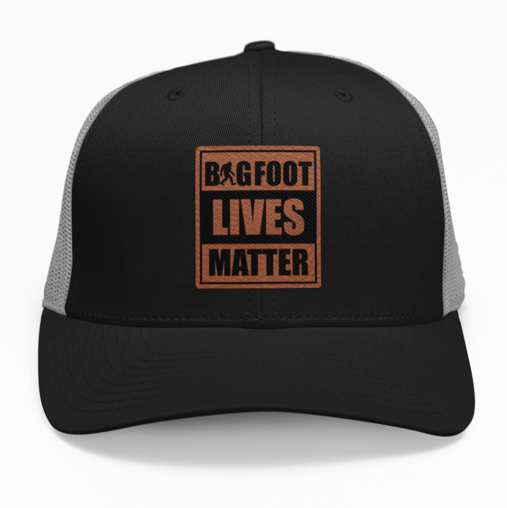 Preview of the 'Bigfoot Lives Matter' leatherette patch on a custom hat, showcasing the fun design on an adjustable snapback.