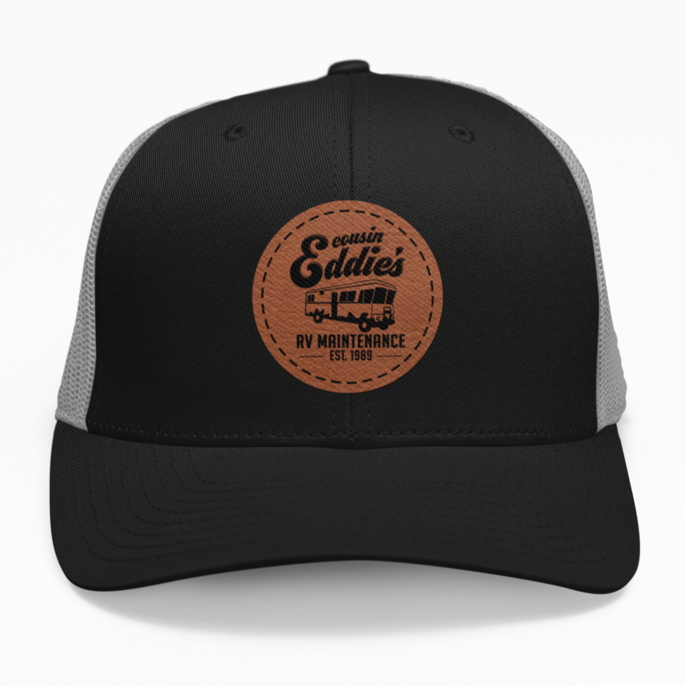 Preview of the "Cousin Eddie's RV Maintenance" leatherette patch on a custom hat.