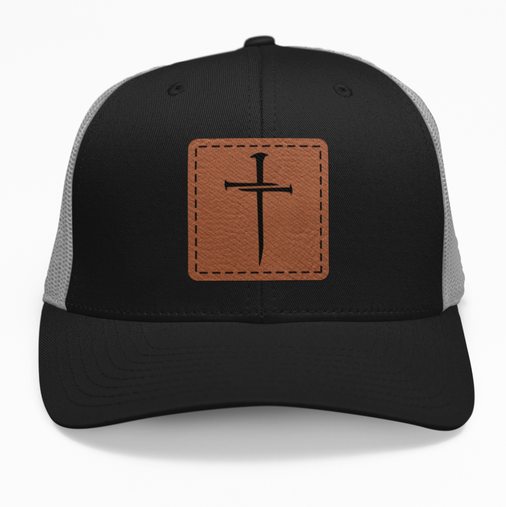 Preview of the "Nail Cross" leatherette patch on a custom hat.