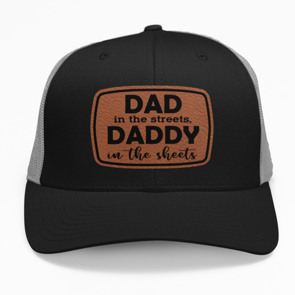 Preview of the "Dad in the Streets, Daddy in the Sheets" leatherette patch on a custom hat.