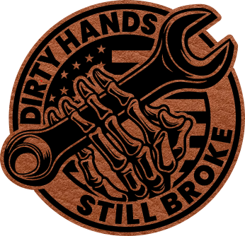 Close-up of the "Dirty Hands, Still Broke" leatherette patch with bold text.