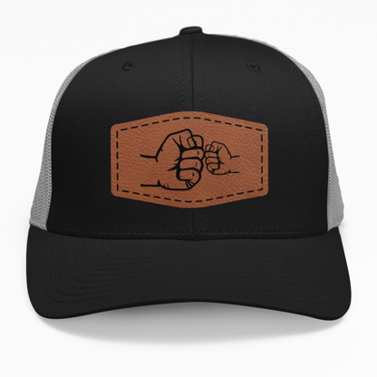 Preview of the "Dad and Son Fist Bump" leatherette patch on a custom hat.