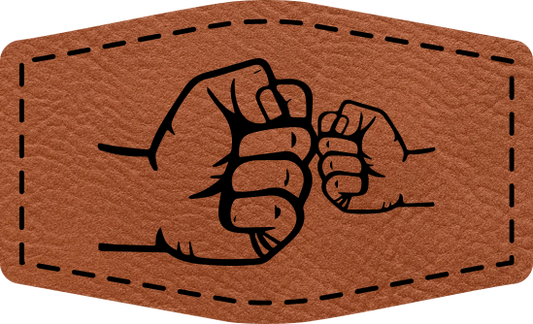 Close-up of the "Dad and Son Fist Bump" leatherette patch featuring a fist bump between a dad and son.