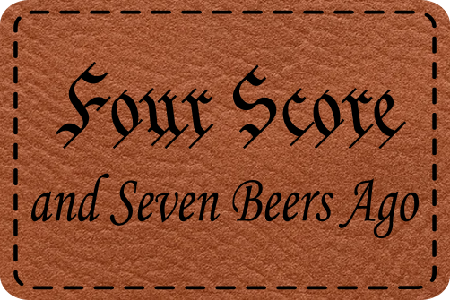 Close-up of the "Four Score & 7 Beers Ago" leatherette patch featuring bold text and a humorous beer theme.