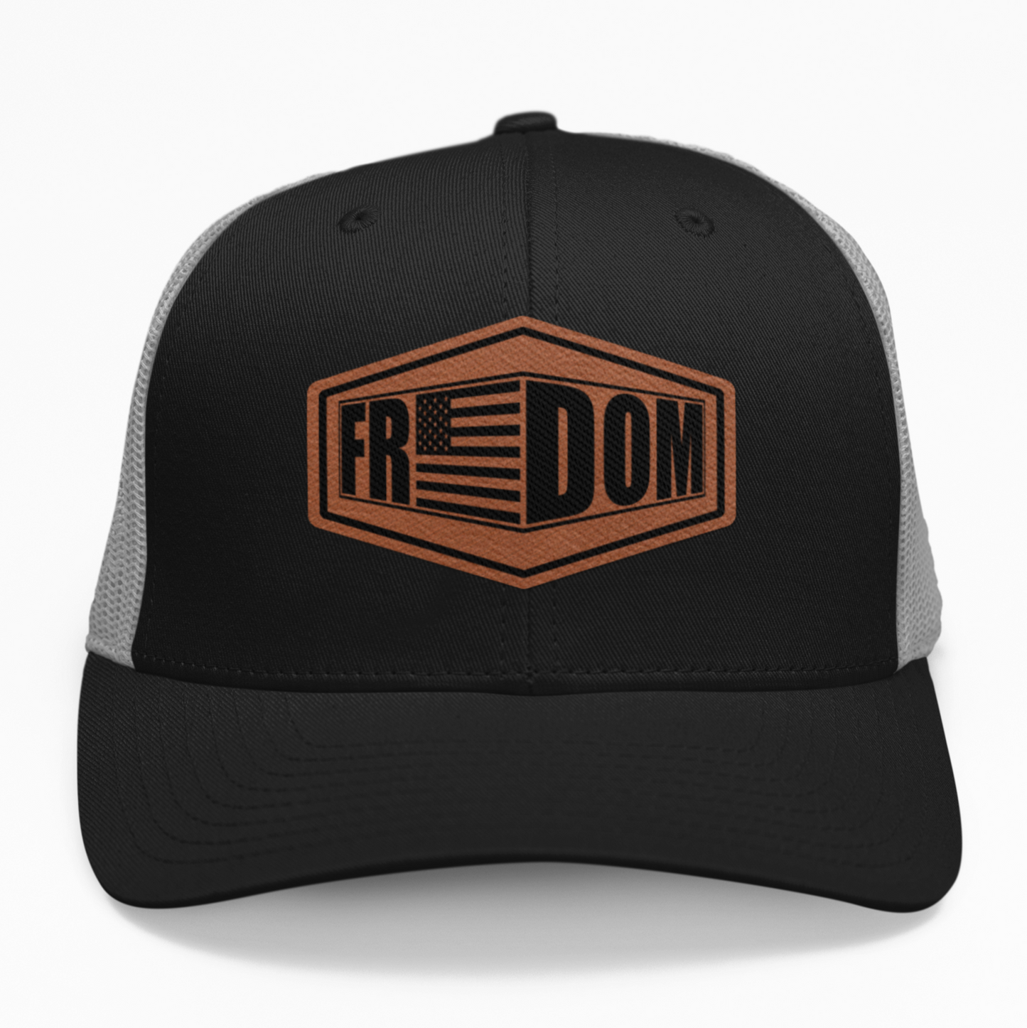 Preview of the 'Freedom' leatherette patch on a custom hat, showing how the bold design looks on an adjustable snapback.