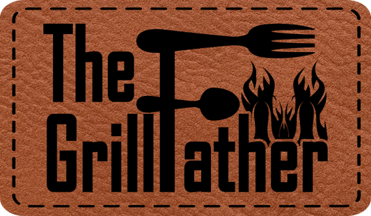 Close-up of the "Grill Father Fork" leatherette patch with a fork and spoon forming the "F."