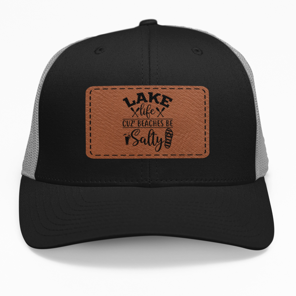 Preview of the "Lake Life Salty Beaches" leatherette patch on a custom hat.