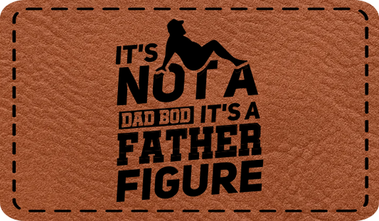 Close-up of the "It’s Not A Dad Bod, It’s a Father Figure" leatherette patch featuring a chunky guy silhouette.