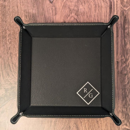 Close up of the custom valet tray with initials. 