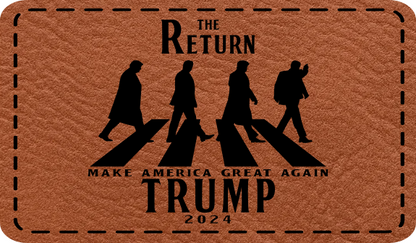 Close-up of the "Return Of Trump" leatherette patch featuring a crosswalk scene inspired by the Beatles.