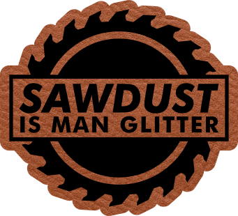 Close-up of the "Saw Dust is Man Glitter" leatherette patch featuring a large saw blade and playful text.