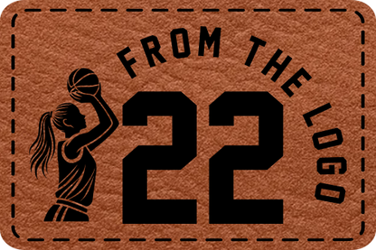 Close-up of the 'From the Logo' leatherette patch featuring Caitlin Clark’s number 22 and lady shooter graphic.