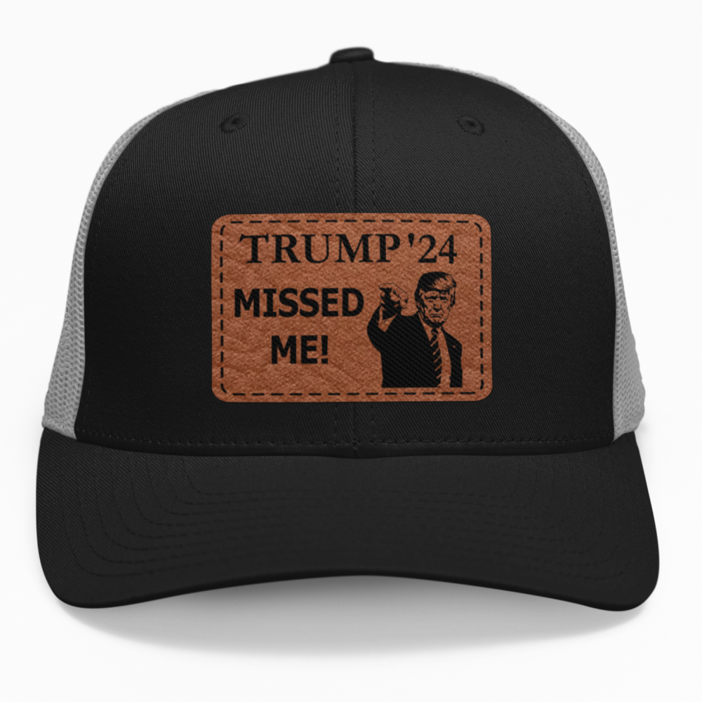 Preview of the "Trump 2024 Missed Me" leatherette patch on a custom hat.