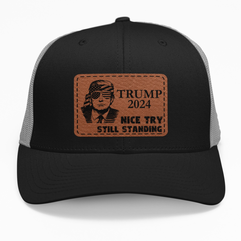 Preview of the "Nice Try. Still Standing" leatherette patch on a custom hat.