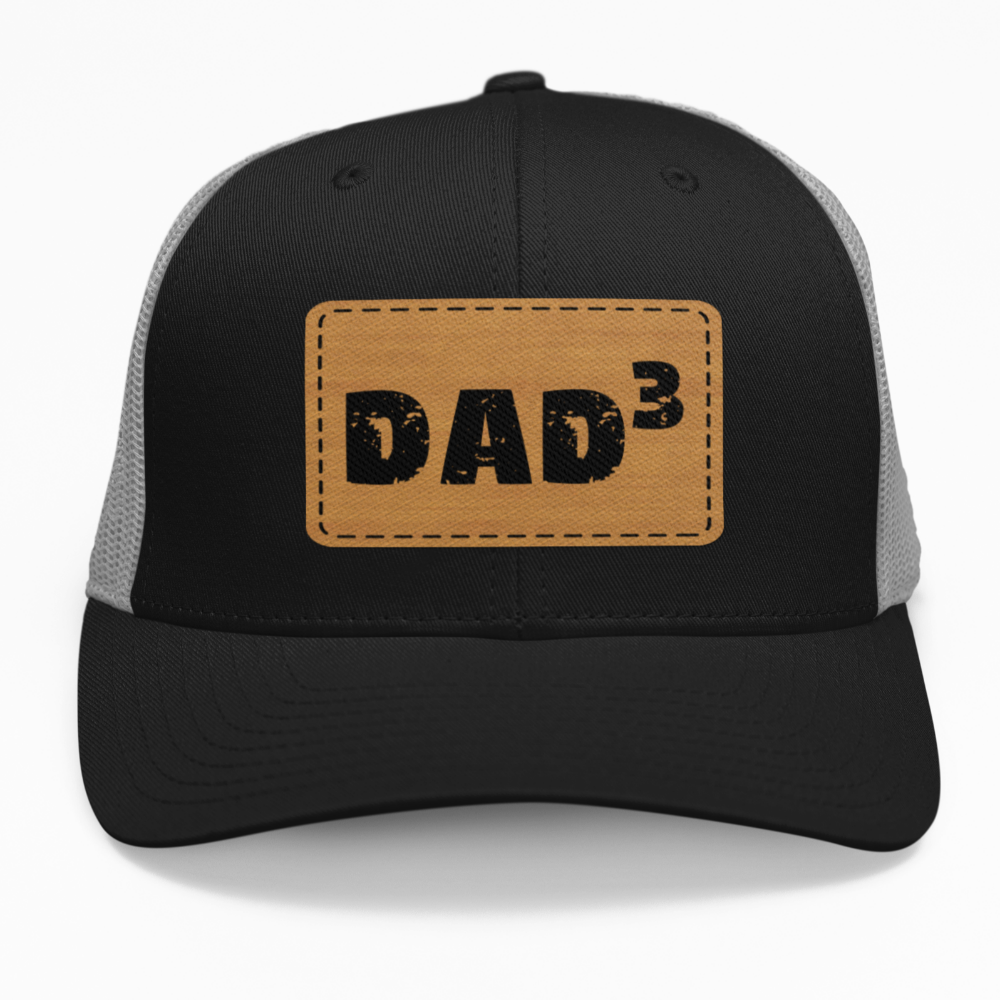 Preview of the customizable "Dad" leatherette patch on a hat, showcasing the personalized number.