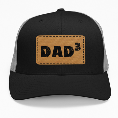 Preview of the customizable "Dad" leatherette patch on a hat, showcasing the personalized number.