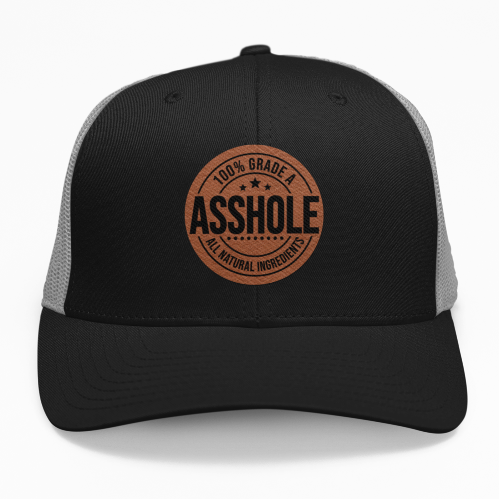 Preview of the '100% Grade A A*Hole' leatherette patch on a custom hat, showcasing the bold and funny design on an adjustable snapback.